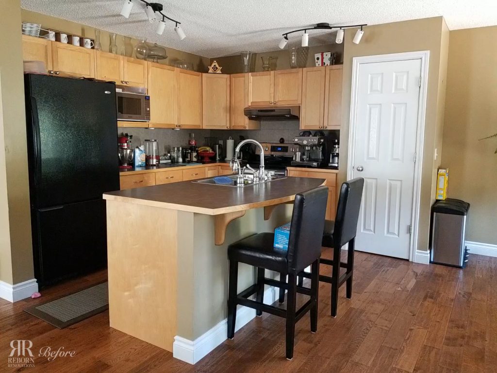 photos of older kitchen, wood well-crafted cabinet and countertops with modern appliances in Calgary.