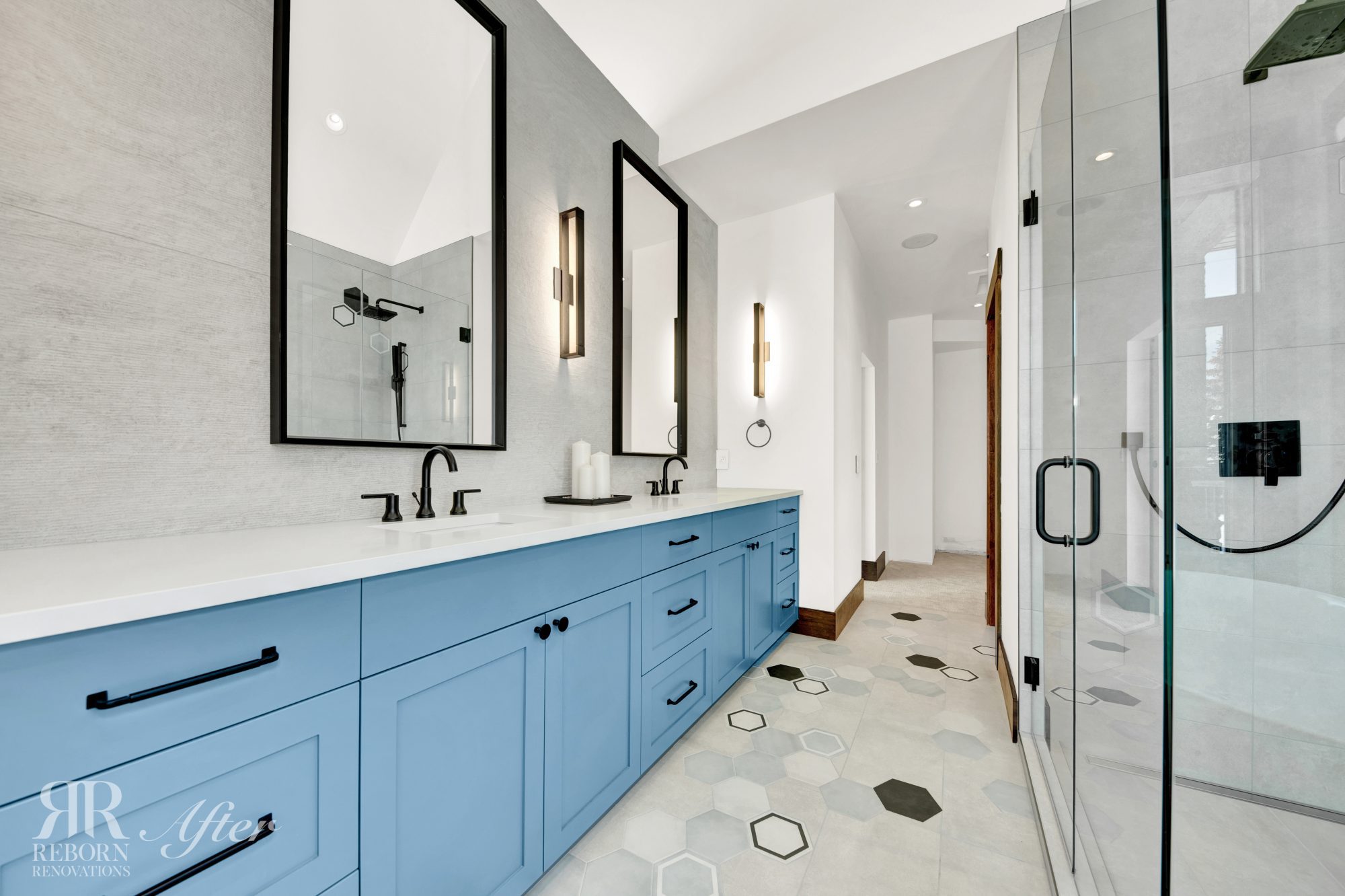 custom blue bathroom vanity with custom tile work