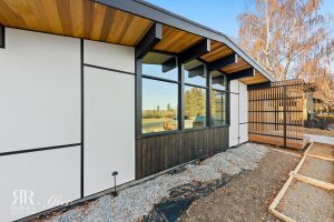 A Wildwood exterior remodel with wood siding.